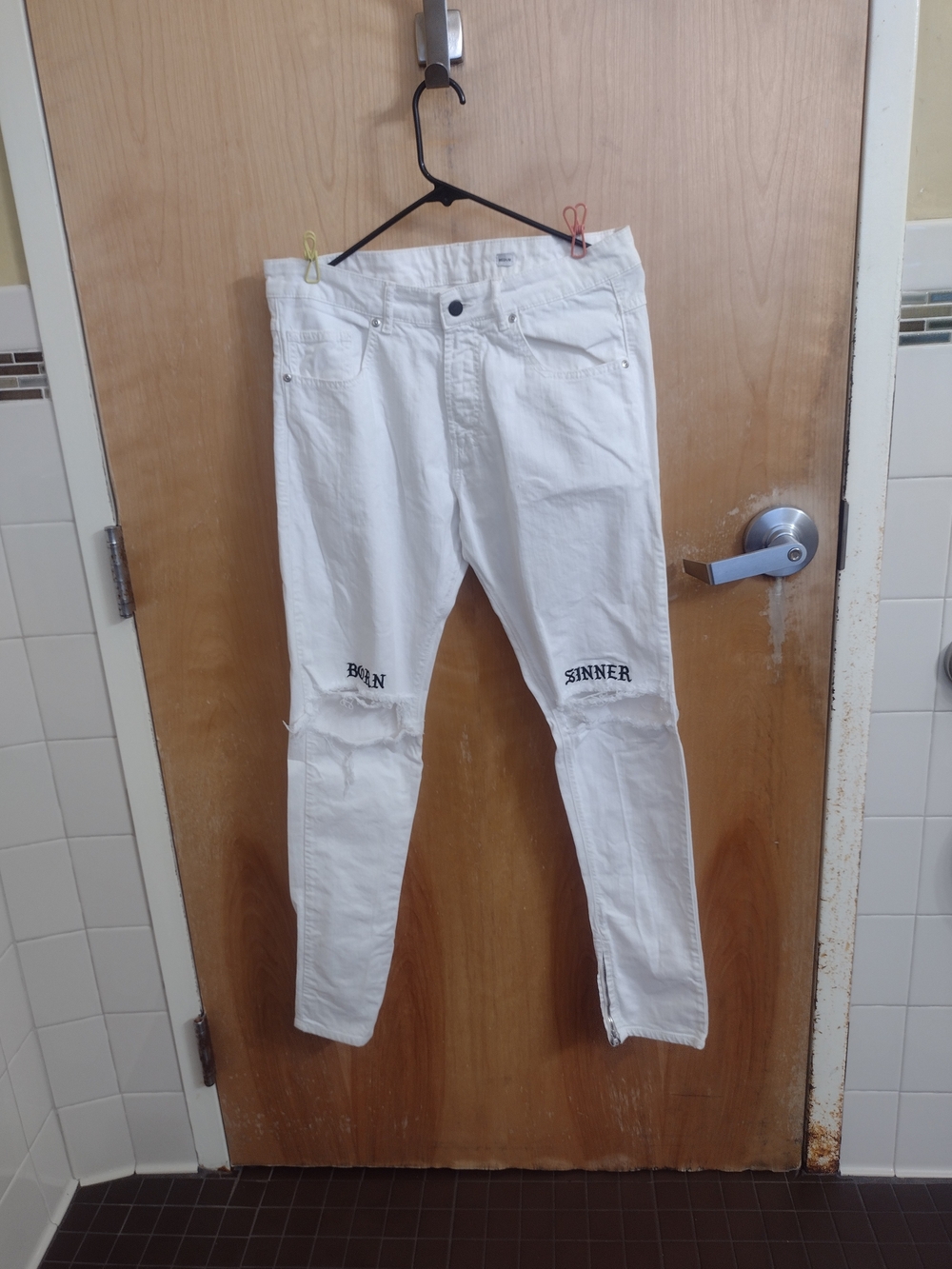 White Distressed Skinny Jeans with 'Born Sinner' Knee Text
